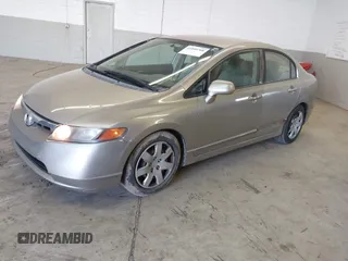 2006 Honda Civic LX z VIN 1HGFA16556L005459, wystawiony jako IAAI lot #41940768 z przebiegiem 178 595 mil mil oraz . Historia ofert i sprzedaży dostępna na DreamBid. Obrazek 18.
