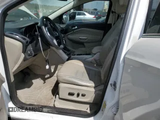 2013 Ford Escape SEL with VIN 1FMCU9H9XDUB08144, listed as a Copart auction lot 52887545 with 142,451 mi miles and Salvage Title. Bid and sale history available at DreamBid. Image 7.