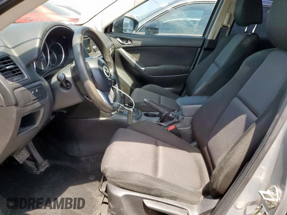 2013 Mazda CX-5 Sport with VIN JM3KE2BE5D0129797, listed as a Copart auction lot 58051185 with 200,712 mi miles and Salvage title. Bid and sale history available at DreamBid. Image 7.