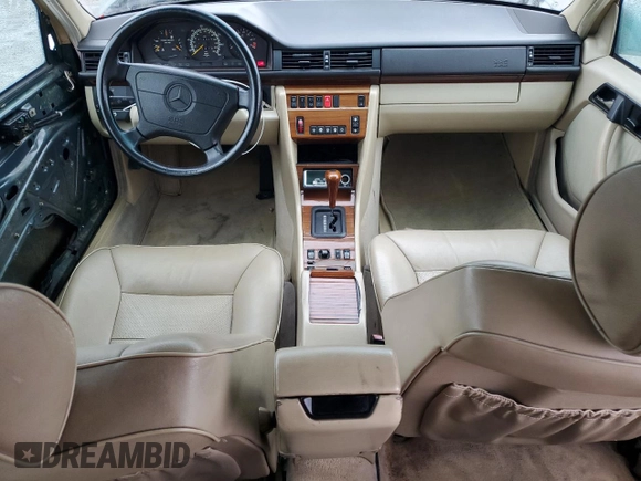 1993 Mercedes-Benz 300 with VIN WDBEA92E7PF259851, listed as a Copart auction lot 50561015 with 214,346 mi miles and Salvage Title. Bid and sale history available at DreamBid. Image 8.