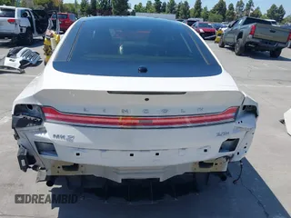 2015 Lincoln MKZ Hybrid with VIN 3LN6L2LU6FR614177, listed as a IAAI auction lot 42442715 with 171,460 mi miles and . Bid and sale history available at DreamBid. Image 17.