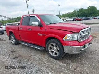 2015 Ram 1500 Laramie z VIN 1C6RR7JM8FS501701, wystawiony jako IAAI lot #42224424 z przebiegiem 59 591 mil mil oraz . Historia ofert i sprzedaży dostępna na DreamBid. Obrazek 1.