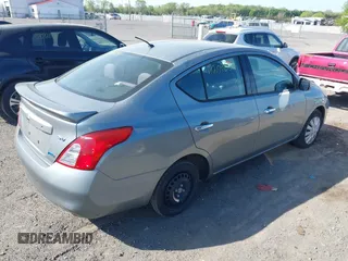 2014 Nissan Versa SV with VIN 3N1CN7AP5EL809218, listed as a IAAI auction lot 42096891 with 87,559 mi miles. Bid and sale history available at carsss.com. Image 4.