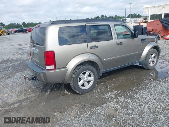 2007 Dodge Nitro SLT z VIN 1D8GT58KX7W689384, wystawiony jako IAAI lot #42139632 z przebiegiem 242 166 mil mil oraz . Historia ofert i sprzedaży dostępna na DreamBid. Obrazek 4.