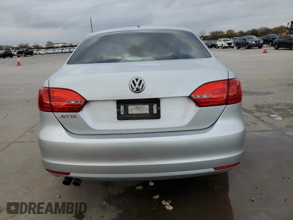 2014 Volkswagen Jetta Sedan S with VIN 3VW2K7AJ0EM311044, listed as a Copart auction lot 85212324 with 128,521 mi miles and Salvage Title. Bid and sale history available at carsss.com. Image 6.