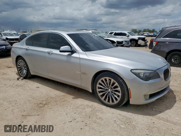 2012 BMW 7 Series 740i with VIN WBAKA4C5XCC613599, listed as a Copart auction lot 62951835 with 102,534 mi miles and Clean title. Bid and sale history available at DreamBid. Image 4.