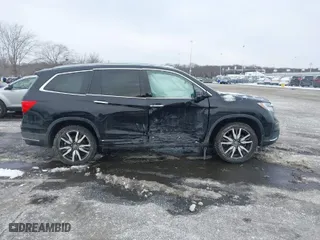 2019 Honda Pilot Touring 7-Passenger with VIN 5FNYF6H62KB098269, listed as a IAAI auction lot 41379812 with 71,992 mi miles. Bid and sale history available at carsss.com. Image 13.