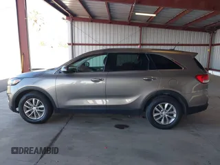 2018 Kia Sorento LX with VIN 5XYPG4A39JG417378, listed as a IAAI auction lot 41671284 with 216,876 mi miles. Bid and sale history available at carsss.com. Image 14.