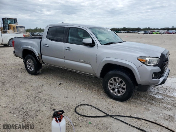 2016 Toyota Tacoma SR5 with VIN 5TFAX5GN4GX069385, listed as a Copart auction lot 88052865 with 123,571 mi miles and Salvage Title. Bid and sale history available at carsss.com. Image 4.