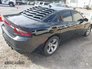 2018 Dodge Charger SXT Plus with VIN 2C3CDXHG1JH139311, listed as a IAAI auction lot 41758392 with 103,034 mi miles and . Bid and sale history available at carsss.com. Image 4.