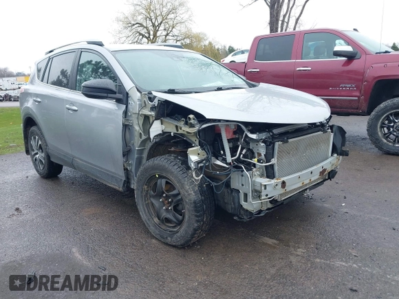 2018 Toyota RAV4 LE with VIN 2T3BFREVXJW717079, listed as a IAAI auction lot 42001580 with 96,044 mi miles. Bid and sale history available at carsss.com. Image 1.