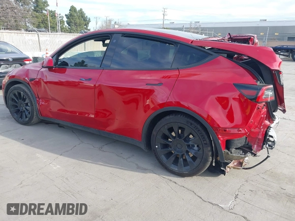2023 Tesla Model Y Long Range with VIN 7SAYGAEE7PF713761, listed as a IAAI auction lot 41638067 with 46,089 mi miles and . Bid and sale history available at DreamBid. Image 3.