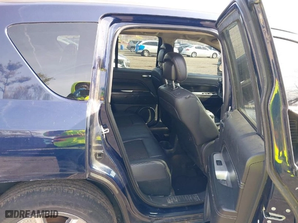 2014 Jeep Compass Latitude with VIN 1C4NJDEB1ED661864, listed as a IAAI auction lot 41950564 with 106,833 mi miles. Bid and sale history available at carsss.com. Image 8.