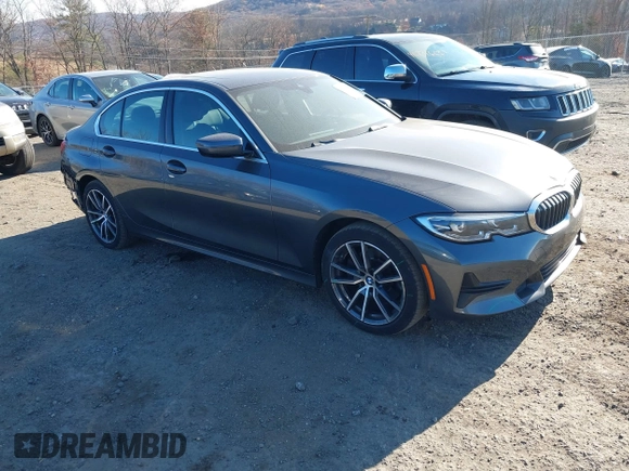 2022 BMW 3 Series 330i xDrive with VIN 3MW5R7J01N8C32331, listed as a IAAI auction lot 40766569 with 27,105 mi miles. Bid and sale history available at carsss.com. Image 1.