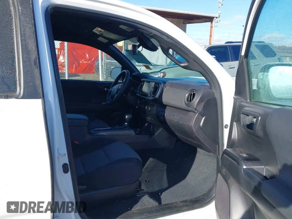 2023 Toyota Tacoma 4WD SR with VIN 3TMCZ5AN1PM538367, listed as a IAAI auction lot 41468684 with 28,879 mi miles. Bid and sale history available at carsss.com. Image 5.