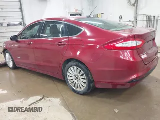 2013 Ford Fusion SE Hybrid with VIN 3FA6P0LU9DR150396, listed as a IAAI auction lot 42080329 with 195,665 mi miles. Bid and sale history available at carsss.com. Image 3.