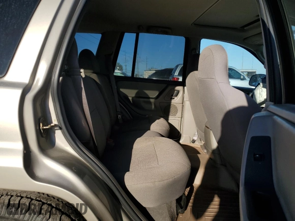 2003 Jeep Grand Cherokee Laredo z VIN 1J4GX48N63C509220, wystawiony jako Copart lot #72730964 z przebiegiem 95 216 mil mil oraz Szkoda całkowita • Salvage title. Historia ofert i sprzedaży dostępna na DreamBid. Obrazek 11.
