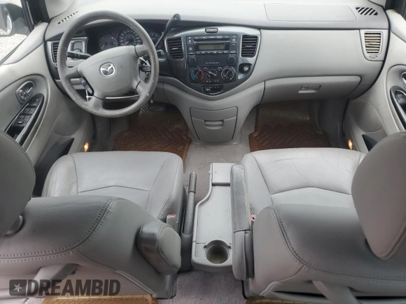 2003 Mazda MPV LX with VIN JM3LW28J730369731, listed as a Copart auction lot 58590885 with 80,179 mi miles and Salvage title. Bid and sale history available at DreamBid. Image 8.