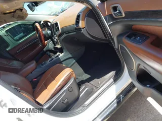 2015 Jeep Grand Cherokee Summit с VIN 1C4RJFJTXFC173287, выставлен на аукционе IAAI как лот 42794100 с пробегом 125 705 миль миль и . История ставок и продаж доступна на DreamBid. Изображение 5.
