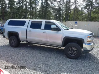 2017 Chevrolet Silverado 1500 LT with VIN 3GCUKREC7HG233366, listed as a IAAI auction lot 42254699 with 105,655 mi miles and . Bid and sale history available at DreamBid. Image 14.
