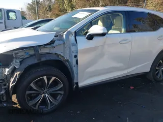 2019 Lexus RX 350L Premium with VIN JTJDZKCA0K2019725, listed as a IAAI auction lot 41303759 with 89,848 mi miles and . Bid and sale history available at DreamBid. Image 17.
