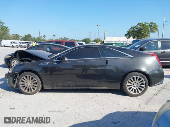2012 Cadillac CTS Premium z VIN 1G6DP1E3XC0116593, wystawiony jako IAAI lot #42138575 z przebiegiem 198 884 mil mil oraz . Historia ofert i sprzedaży dostępna na DreamBid. Obrazek 14.
