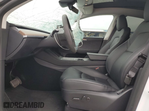 2023 Tesla Model Y Long Range with VIN 7SAYGDEE2PF860135, listed as a Copart auction lot 50380975 with 25,334 mi miles and Salvage Title. Bid and sale history available at DreamBid. Image 7.