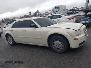 2006 Chrysler 300 with VIN 2C3KA43RX6H470150, listed as a IAAI auction lot 41767272 with 107,457 mi miles. Bid and sale history available at carsss.com. Image 13.
