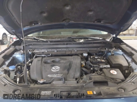 2019 Mazda CX-5 Touring with VIN JM3KFBCM1K0584369, listed as a IAAI auction lot 41657765 with 77,934 mi miles. Bid and sale history available at carsss.com. Image 10.