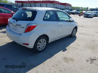 2014 Toyota Yaris L with VIN VNKJTUD35EA011933, listed as a IAAI auction lot 42150303 with 114,369 mi miles. Bid and sale history available at carsss.com. Image 4.