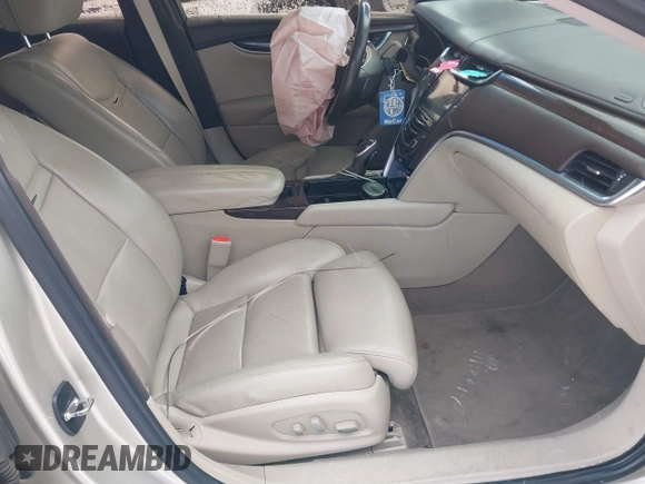 2014 Cadillac XTS Luxury z VIN 2G61M5S37E9304598, wystawiony jako IAAI lot #41006051 z przebiegiem 115 879 mil mil oraz . Historia ofert i sprzedaży dostępna na DreamBid. Obrazek 5.
