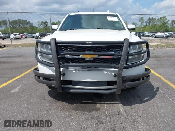 2016 Chevrolet Tahoe Commercial with VIN 1GNLCDEC5GR423300, listed as a IAAI auction lot 41967399 with 147,429 mi miles and . Bid and sale history available at DreamBid. Image 12.