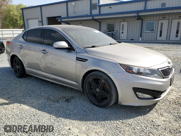 2012 Kia Optima SX with VIN 5XXGR4A66CG022411, listed as a Copart auction lot 49987235 with 219,814 mi miles and Salvage Title. Bid and sale history available at carsss.com. Image 4.