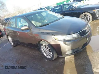 2012 Kia Forte EX with VIN KNAFU4A27C5476031, listed as a IAAI auction lot 41633058 with 137,998 mi miles. Bid and sale history available at carsss.com. Image 1.