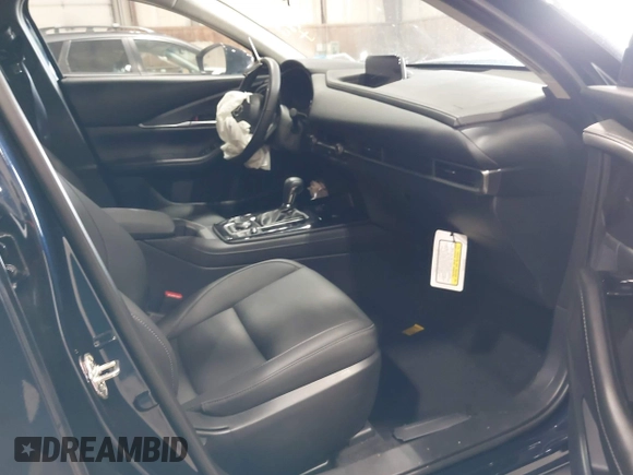 2024 Mazda CX-30 S Select Sport z VIN 3MVDMBBM2RM707143, wystawiony jako IAAI lot #42267284 z przebiegiem 6 133 mil mil oraz . Historia ofert i sprzedaży dostępna na DreamBid. Obrazek 5.