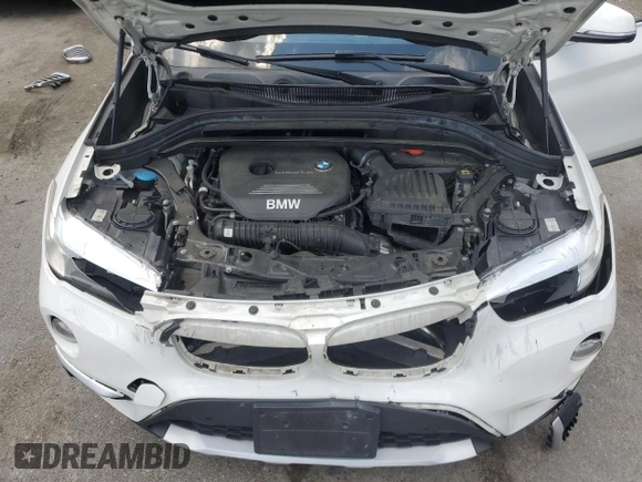 2018 BMW X1 xDrive28i with VIN WBXHT3C35J5F90062, listed as a Copart auction lot 56284945 with 138,137 mi miles and Salvage title. Bid and sale history available at DreamBid. Image 11.