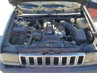 1995 Jeep Grand Cherokee Laredo with VIN 1J4FX58S5SC741328, listed as a Copart auction lot 82034594 with 260,398 mi miles and Clean Title. Bid and sale history available at carsss.com. Image 12.