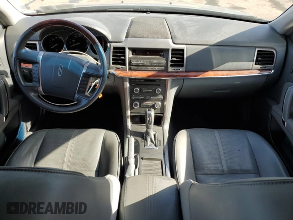 2010 Lincoln MKZ с VIN 3LNHL2GC7AR601053, выставлен на аукционе Copart как лот 54455795 с пробегом 176 451 миль миль и Списание • Salvage title. История ставок и продаж доступна на DreamBid. Изображение 8.