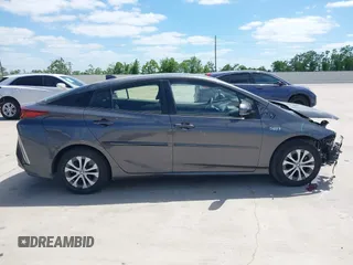 2021 Toyota Prius LE with VIN JTDKAMFP3M3193640, listed as a IAAI auction lot 42023593 with 17,841 mi miles and . Bid and sale history available at DreamBid. Image 14.