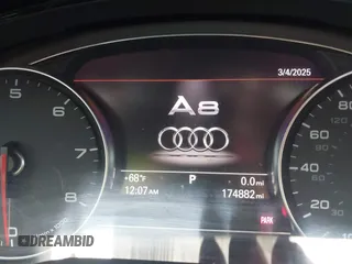 2015 Audi A8 L 4.0T with VIN WAU32AFD4FN033471, listed as a IAAI auction lot 42120112 with 174,882 mi miles. Bid and sale history available at carsss.com. Image 15.