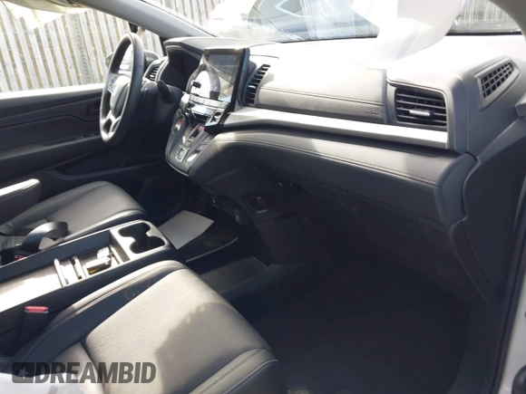 2024 Honda Odyssey EX-L with VIN 5FNRL6H65RB007535, listed as a IAAI auction lot 40602982 with 6,097 mi miles and . Bid and sale history available at DreamBid. Image 5.
