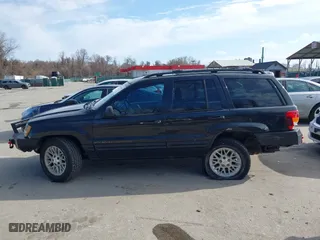 2004 Jeep Grand Cherokee Limited with VIN 1J4GW58N74C120435, listed as a IAAI auction lot 41815094 with 193,056 mi miles. Bid and sale history available at carsss.com. Image 14.