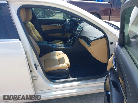 2013 Cadillac ATS Premium z VIN 1G6AE5S35D0129175, wystawiony jako IAAI lot #42037872 z przebiegiem 95 747 mil mil oraz . Historia ofert i sprzedaży dostępna na DreamBid. Obrazek 5.