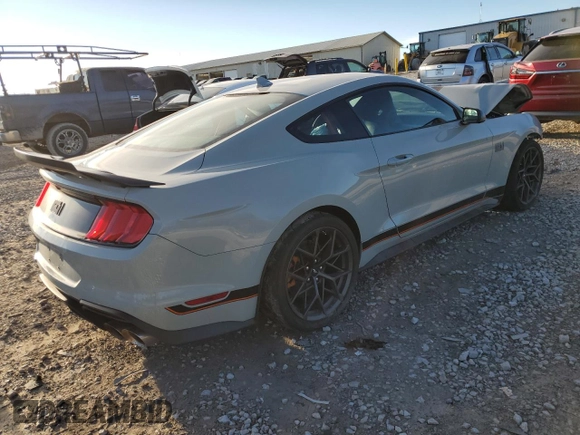 2021 Ford Mustang Mach 1 with VIN 1FA6P8R06M5551345, listed as a Copart auction lot 86491604 with 7,374 mi miles and Salvage Title. Bid and sale history available at carsss.com. Image 3.