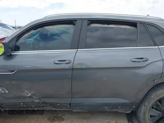2024 Volkswagen Atlas SE z VIN 1V2JE2CA1RC252078, wystawiony jako IAAI lot #42061482 z przebiegiem 10 396 mil mil oraz . Historia ofert i sprzedaży dostępna na DreamBid. Obrazek 15.