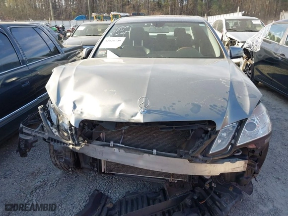 2012 Mercedes-Benz E-Class E 350 Luxury with VIN WDDHF8JB9CA568297, listed as a IAAI auction lot 41816749 with 157,328 mi miles. Bid and sale history available at carsss.com. Image 12.