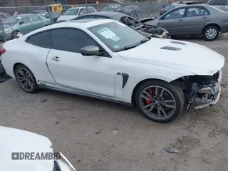 2021 BMW 4 Series M440i xDrive with VIN WBA13AR06MCF78418, listed as a IAAI auction lot 41257716 with 35,974 mi miles and . Bid and sale history available at carsss.com. Image 13.