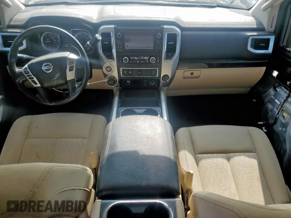 2016 Nissan Titan Platinum Reserve with VIN 1N6BA1F42GN506140, listed as a Copart auction lot 57171395 with 141,295 mi miles and Salvage title. Bid and sale history available at DreamBid. Image 8.