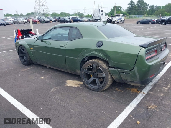 2021 Dodge Challenger R/T Scat Pack z VIN 2C3CDZFJ2MH559741, wystawiony jako IAAI lot #42264991 z przebiegiem 51 040 mil mil oraz . Historia ofert i sprzedaży dostępna na DreamBid. Obrazek 3.