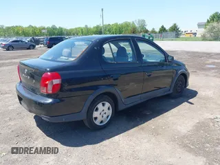 2000 Toyota ECHO z VIN JTDBT123XY5020929, wystawiony jako IAAI lot #42234819 z przebiegiem 144 560 mil mil oraz . Historia ofert i sprzedaży dostępna na DreamBid. Obrazek 4.